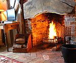 Spadgers Cottage with open fire, Suffolk, England Spadgers Cottage with open fire, Suffolk, England