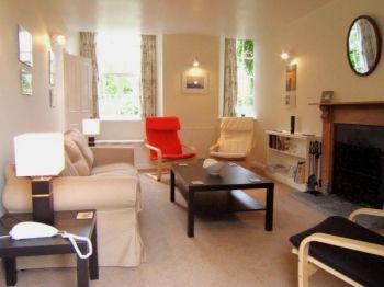 Cosy sitting room with open fire