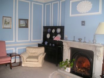 Old wood panelled sitting room. This is the quiet end of the house.