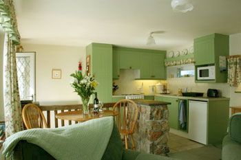 Fresh green colour scheme inside this cottage for 2