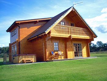 Enjoy the cosy ambiance of a log cabin holiday