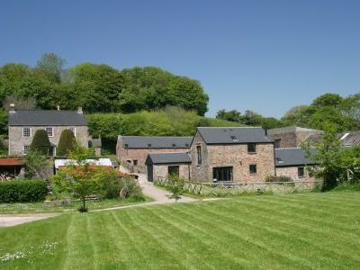 Self-catering cottage with own enclosed garden and sundeck overlooking the lily pond