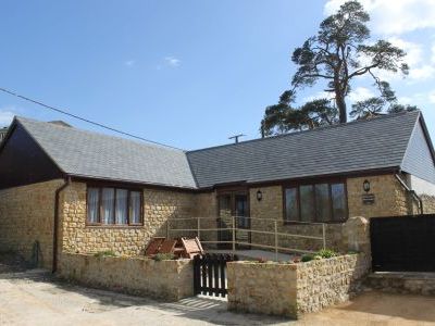 Bakers Mill Holiday Cottages nestling in The Axe Valley within dorsets Area of Outstanding Natural Beauty