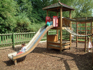 Play Area with Slide and Climbing Frame at Cottage