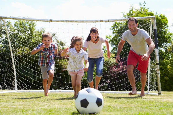 Family playing football