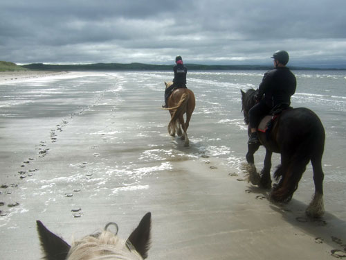 horse riding on the beach in Ireland