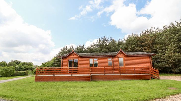 Pine lodge breaks with a swimming pool   in Heart of England