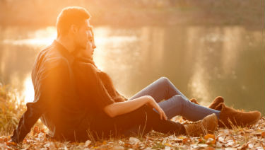 Romantic couple by a lakeside